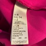 Topshop  fuchsia polyester flowy size 2 shorts. Photo 4