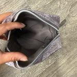 Bath & Body Works Glittery silver makeup bag with bow detail  Photo 9