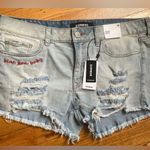 EXPRESS NWT  Shortie Relaxed Low Rise Ripped Jean Shorts Size 10 Photo 0