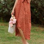 SheIn Orange and White Floral Tie Asymmetrical Hem Skirt Photo 0