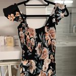 American Rag Black and Floral Jumpsuit with slits in legs Photo 1