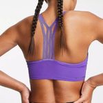Nike Training Indy Ulterbreathe Dri-FIT ADV light support sports bra in purple Photo 2