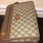 Gucci GG Supreme Clutch with Gold GG Zipper Pulls On Top Close and Front Pocket Photo 7