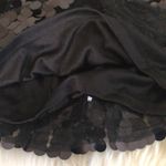 Party fun skirt with dimensional detail with movement . Photo 1