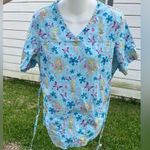 Disney Light Blue Tinkerbell Scrub Top with Floral Accents Photo 0