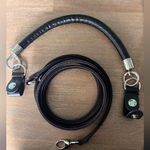 Good condition o pocket with 2 interchangeable flaps and handle. Black Photo 8