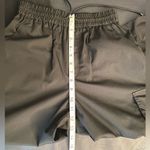 EUC GU Black Cargo Pull Photo 4