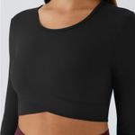 Halara  medium black cropped long sleeve thumb hole Crossover cropped yoga top Photo 1