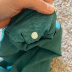 Lululemon Invigorate High-Rise Tight 25” in Crunch Teal Lagoon size 4 Photo 6