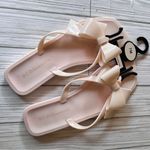 BCBGeneration Glossy Bow Flat Sandals Sz 7 NWT Photo 0