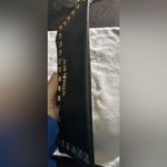 Michael Kors  Womens Saffiano Leather Stud Long Zip Clutch with gold tone studs. Photo 7