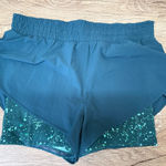 Athleta  lot of 4 women’s‎ shorts  size large Photo 0