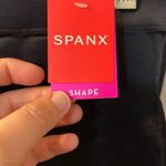 Spanx  half slip in black. NWT. #10179R tummy control panel. 1 small and 1 medium Photo 2
