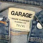 Garage  distressed denim jacket with frayed detailing and button-up closure Photo 2