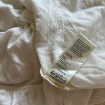 Free People NEW  Claire Tee Tunic Top Eyelet Embroidered Ruffle Slouchy Sz L NWOT Photo 9