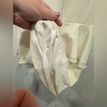 Cachet Cream Peplum Dress with Rhinestone Detail Photo 10