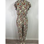 Free People  X Revolve Ruffle Your Feather Floral V-Neck Jumpsuit. Size S Photo 6