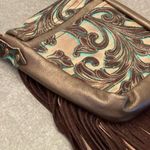 Hide Junky Metallic bronze and accents in turquoise and brown embossed crossbody purse Photo 3