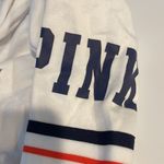 PINK - Victoria's Secret White with blue and red stripe sleeve hooded sweatshirt from PINK Photo 2