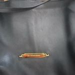 Burberry This is a  Little Crush crossbody bag in black leather and House check fabric.  Photo 5