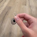 Black and Silver Dangly Oval Earrings Photo 1