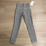 Athleta NWT  Salutation Stash 7/8 Tight Textured Cheetah Leopard Size XXS Photo 1