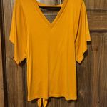 Daytrip  open back top. Photo 0