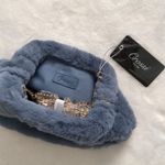 Forever 21 New Grossi faux fur crossbody hand bag from  Photo 3