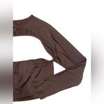brown cropped long sleeve going out top with cut out Size M Photo 2