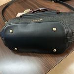 Michael Kors .
Crossbody Bag Preowned with wear! Photo 2