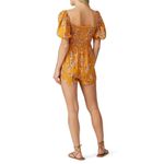 Flynn Skye Justine Romper Women's Medium Orange Floral Puff Sleeve Smocked RTR Photo 1