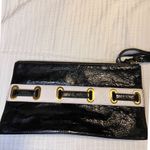 Carlisle Black & White Patent Leather Clutch w/Gold Hardware and Buckle Detail Black Photo 4