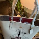 Coach Authentic Pebbled leather/signature coated canvas Cruella snap magnet tote Photo 8