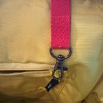 Petunia Pickle Bottom Diaper Bag. Red and Yellow Women's Diaper Bag Photo 6