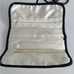 Joie  Roll up jewelry travel case. Cream quilted Satin w/ black trim Photo 3
