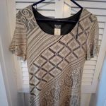 Women Vintage Helene Blake Dress
Gold Crocheted with black lining and Fringe Size 6 Photo 1
