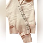 Nike  Pro Cropped Crewneck Sweatshirt Dri-FIT Blush Pink Women’s M Photo 2