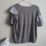 A. OK Coevolution gray shirt w ruffle sleeve Size M Photo 3