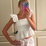 Francesca's white ruffle top Photo 0