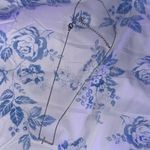 silver sideways diamond cross necklace Photo 0