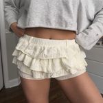 SheIn ivory ruffle soft cotton micro shorts with belt loops small Photo 0