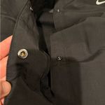 Nike Sportswear Essential
Women's Oversized UV Woven Coaches size Large black Photo 5