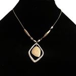Kenneth Cole two tone asymmetrical drop pendant necklace Photo 0