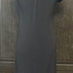 Voir Voir Black Shortsleeved dress with 4 buttons M Photo 1