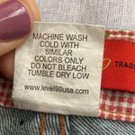 Level 99 flared leg darker denim jeans with rhinestone belt loops. Size 28 Photo 7