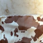 Altar'd State NWT Cow print bell bottoms Photo 2