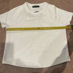 Under Armour Women's white loose baggy short sleeve too Photo 2