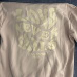 Amazon Love Never Fails  Hoodie Photo 1