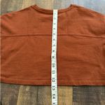 Alphalete NWT  Crop Top Rust Brown Short Sleeve Gym Tee Size XS Photo 7