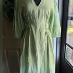COS  voluminous v-neck light green midi dress, size 8 Photo 0